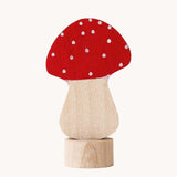 A Grimm's red and white fly agaric mushroom decorative figure for a celebration ring. 