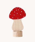 A Grimm's red and white fly agaric mushroom decorative figure for a celebration ring. 