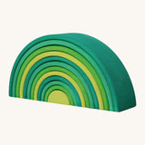 A Grimms forest large wooden rainbow 12 piece set available at Babipur. This set is hand made and hand painted in different shades of green.