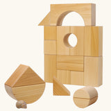Grimm's giant natural wooden building blocks set used to create a boat shape.