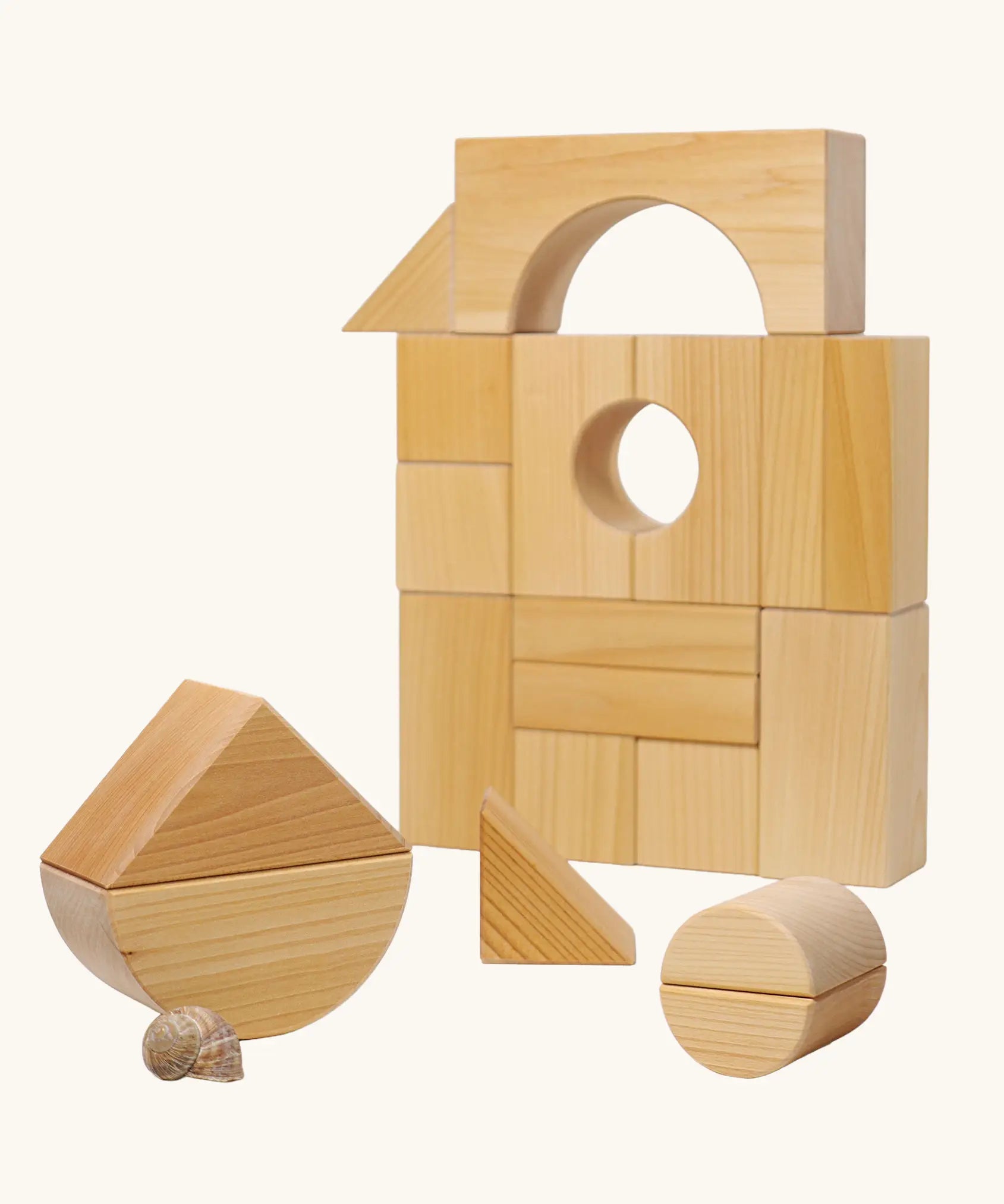 Grimm's giant natural wooden building blocks set used to create a boat shape.