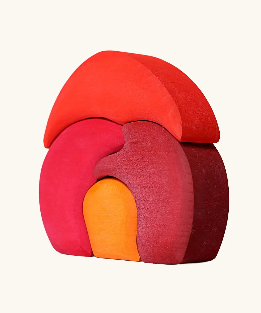 Back of Grimm's gnome house wooden stacking toy. 4 piece red and orange wooden block puzzle.