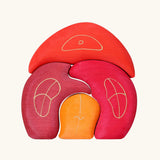 Grimm's gnome house wooden stacking toy. 4 piece red and orange wooden block puzzle.