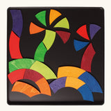 Palm trees made from the Grimm's bright wooden Goethe magnetic pieces displayed in a tin 