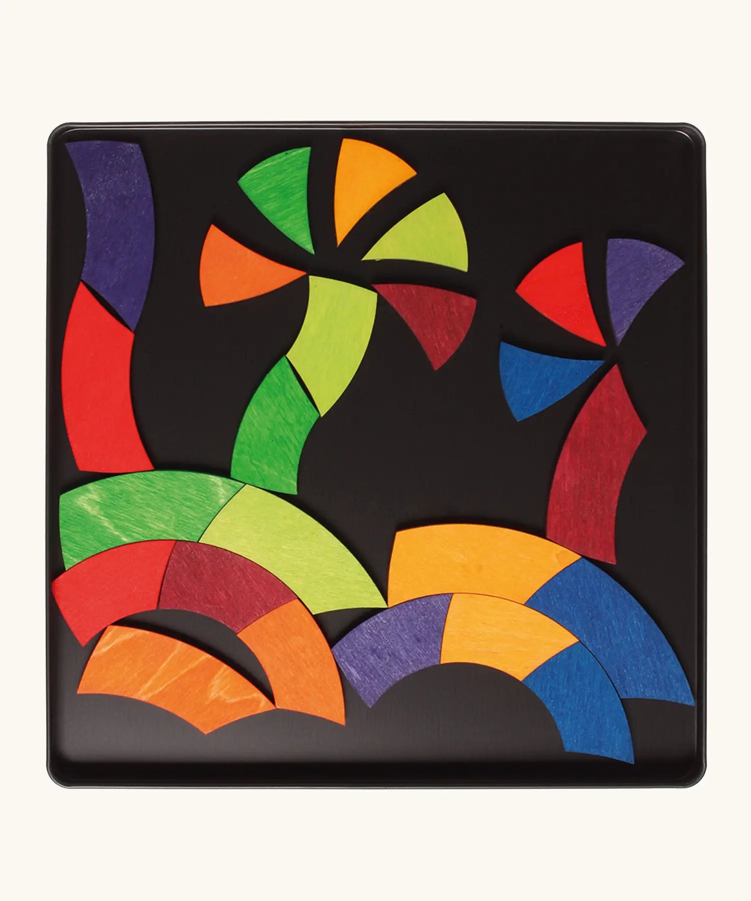 Palm trees made from the Grimm's bright wooden Goethe magnetic pieces displayed in a tin 