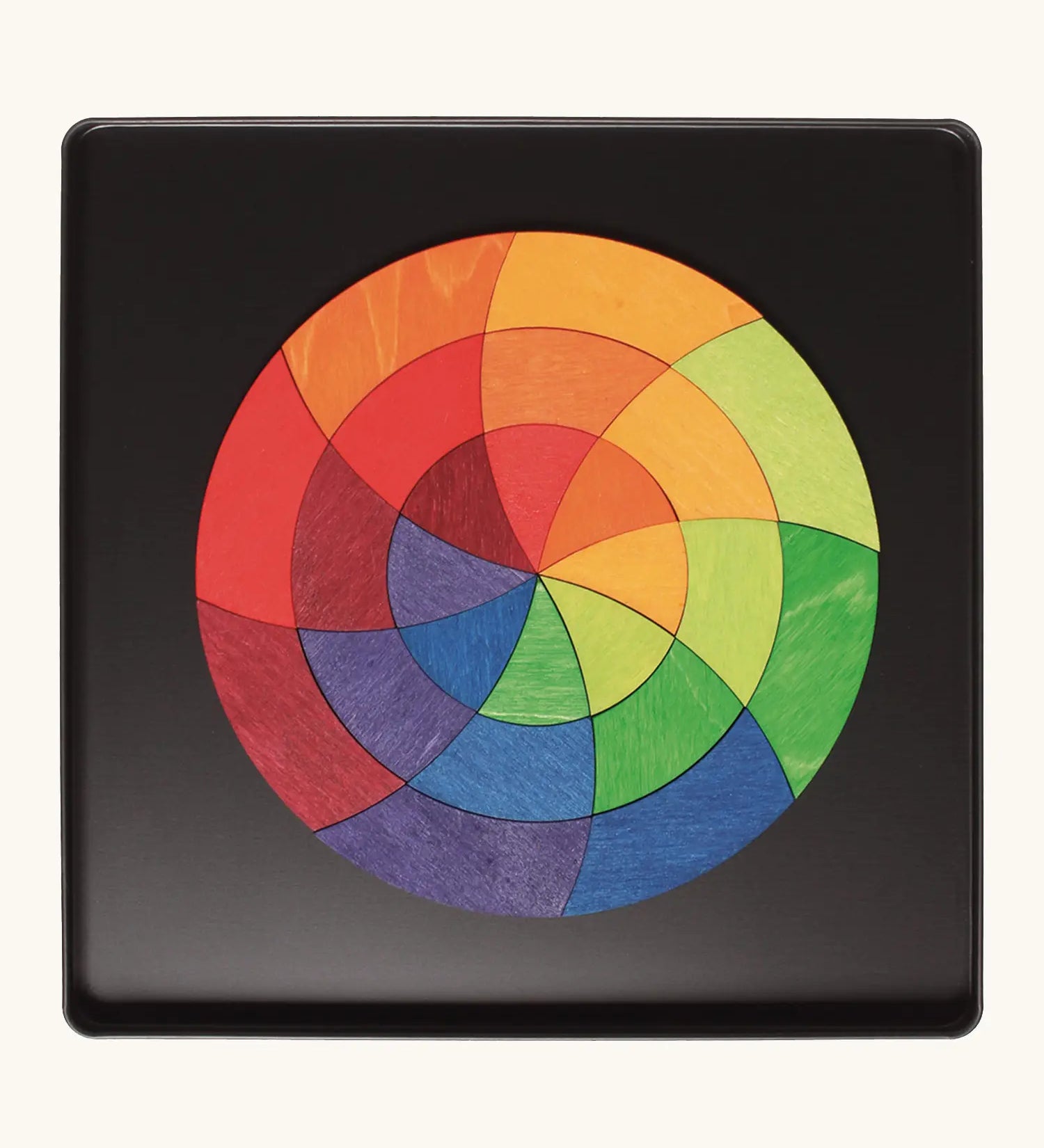 Grimms Goethe magnetic puzzle set. Includes 24 plywood magnetic pieces in bright colours and a storage tin