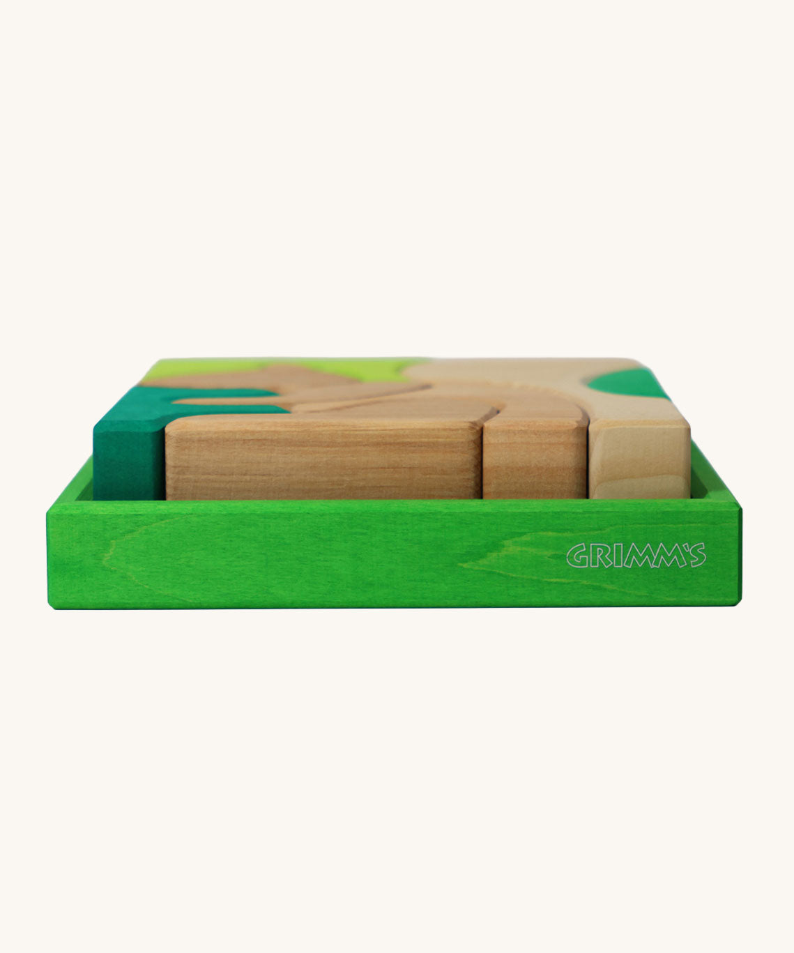 A side profile view of the green coloured wooden storage tray that the Grimm's green squirrel building set comes in. A set of green and natural wooden blocks that form a shape of a squirrel when placed into the green coloured wooden storage tray. These Grimm's toys are part of a wide range of wooden toys available here at Babipur. 
