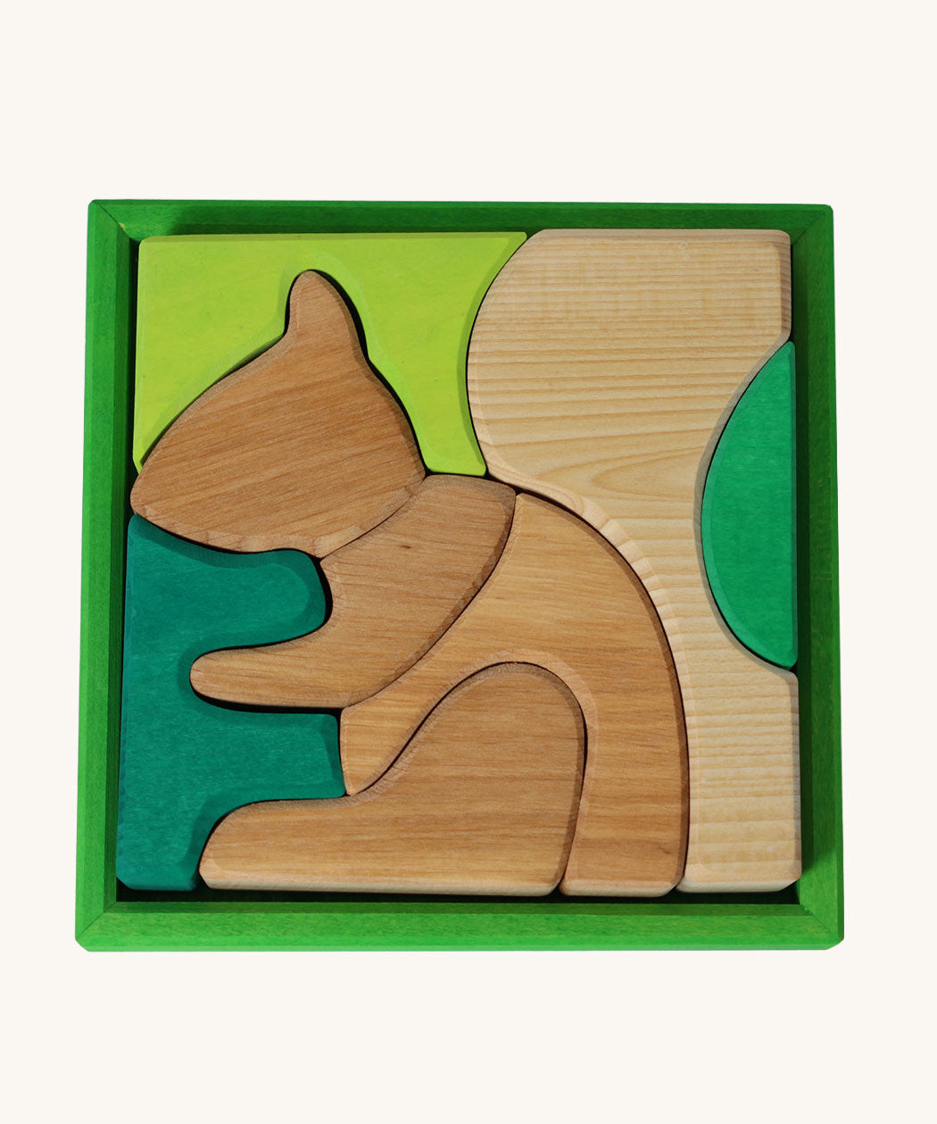 Grimm's green squirrel building set. A set of green and natural wooden blocks that form a shape of a squirrel when placed into the green coloured wooden storage tray. These Grimm's toys are part of a wide range of wooden toys available here at Babipur. 