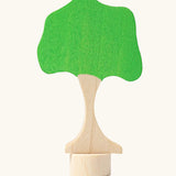Grimms handcrafted wooden green tree decorative figure with a unpainted stand made to slot in the celebration ring