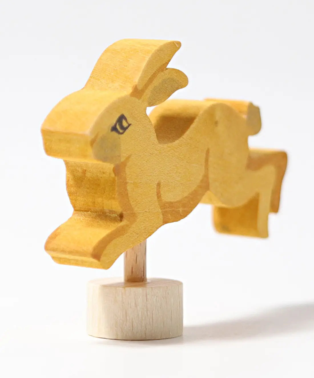 Front of Grimm's handcrafted wooden jumping rabbit decorative figure showing hand painted facial features