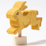 Front of Grimm's handcrafted wooden jumping rabbit decorative figure showing hand painted facial features