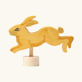 Grimm's handcrafted wooden jumping rabbit decorative figure with a unpainted stand