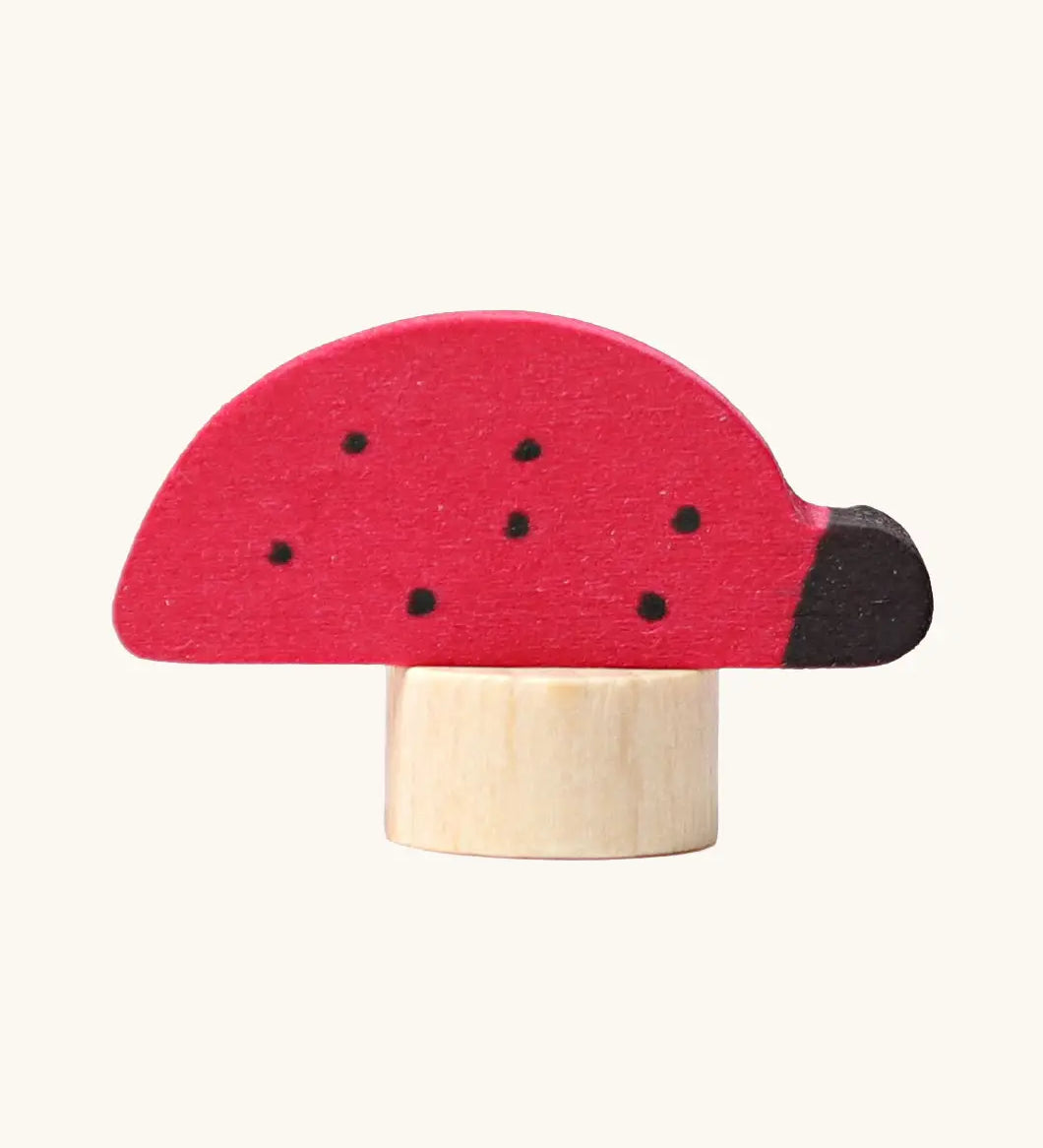 Grimm's handcrafted wooden ladybird decorative figure with a unpainted stand