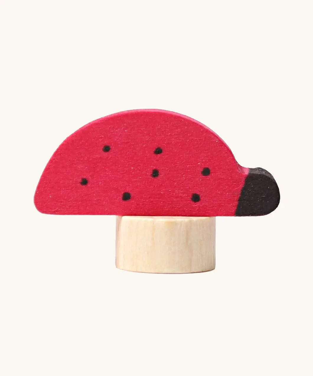 Grimm's handcrafted wooden ladybird decorative figure with a unpainted stand