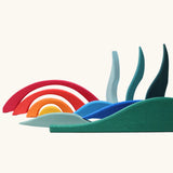 Blocks from Grimm's landscape puzzle wooden toy set used to create a landscape scene. 