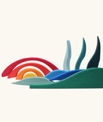 Blocks from Grimm's landscape puzzle wooden toy set used to create a landscape scene. 