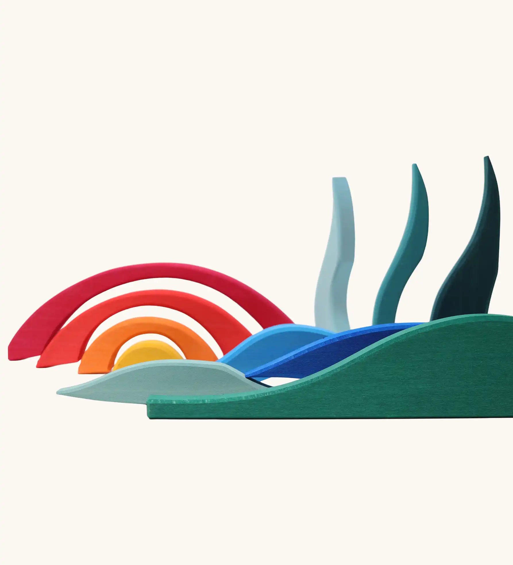 Blocks from Grimm's landscape puzzle wooden toy set used to create a landscape scene. 