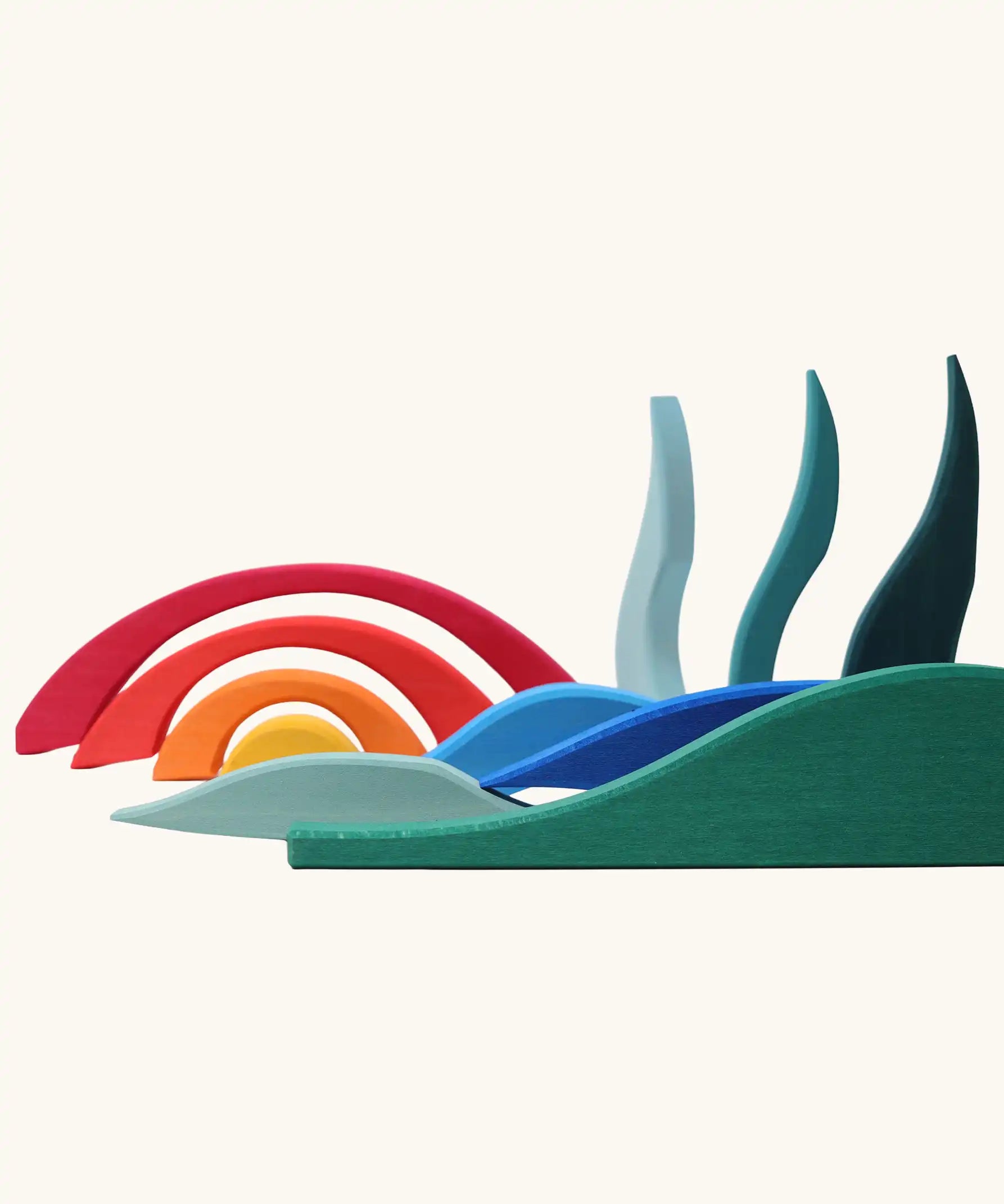 Blocks from Grimm's landscape puzzle wooden toy set used to create a landscape scene. 