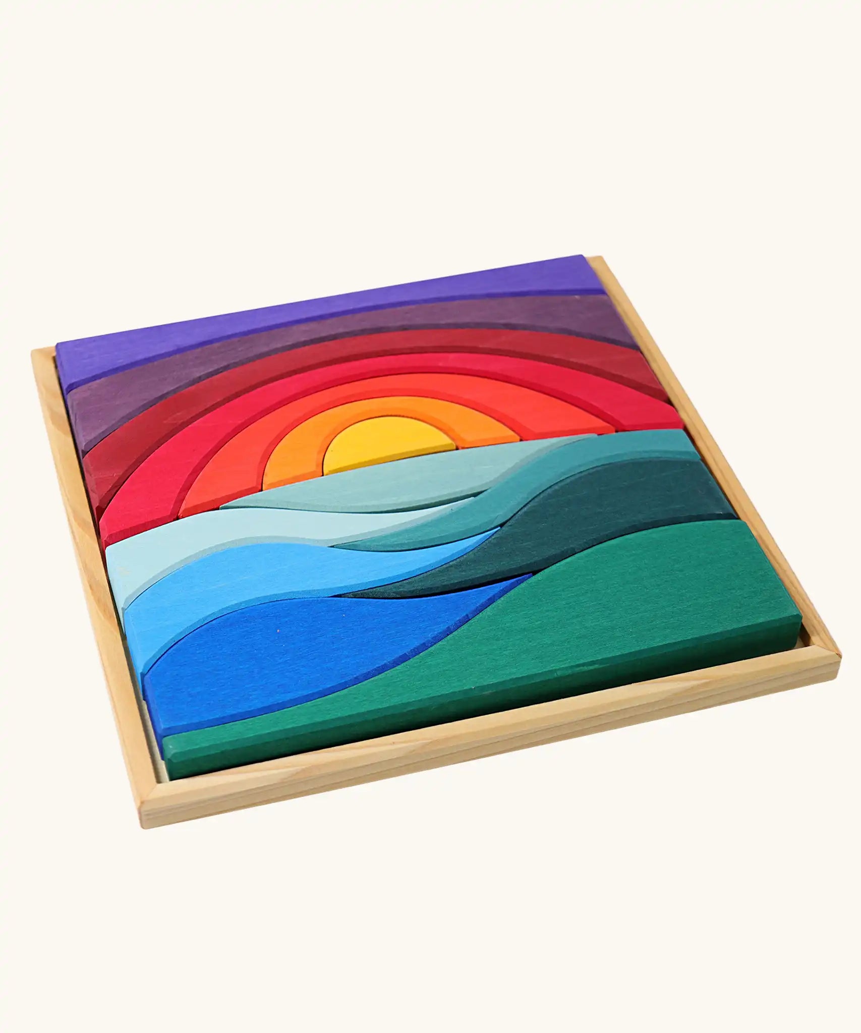 Grimm's landscape puzzle wooden toy set in a display storage tray. 