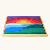 Grimm's landscape puzzle wooden toy set in a display storage tray. 