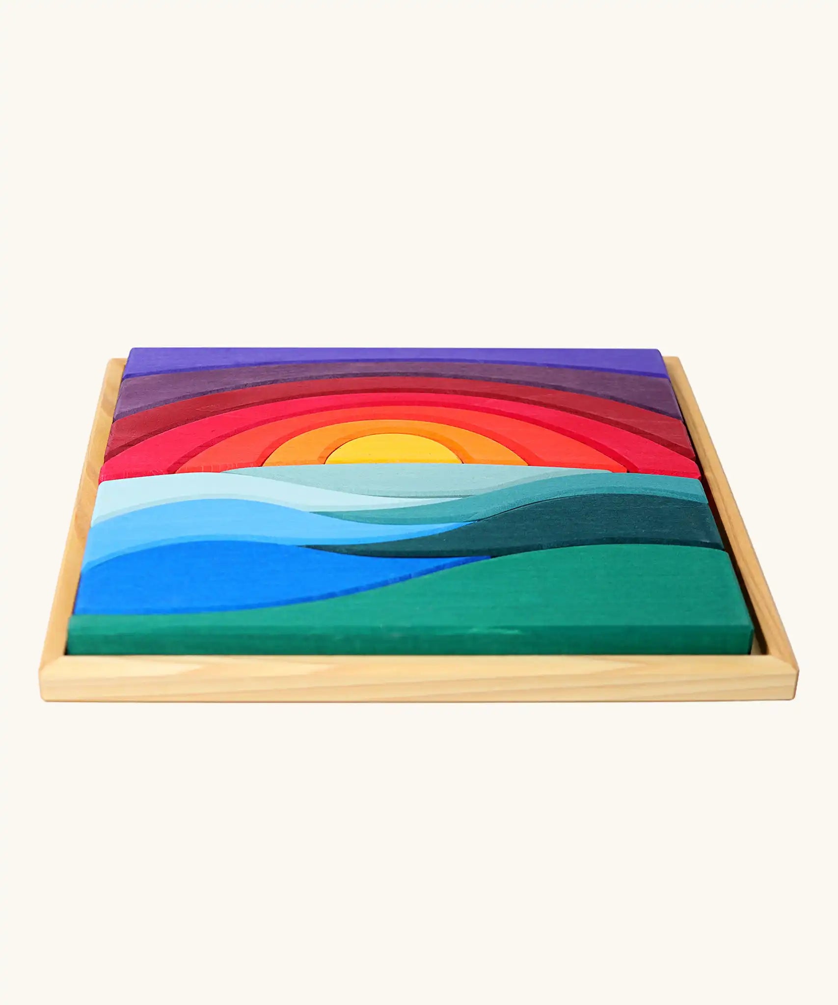Grimm's landscape puzzle wooden toy set in a display storage tray. 
