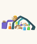 Earth elements from the Grimm's Large 4 Elements wooden Building Set used in a small world play set up with Grimm's friends and cars.