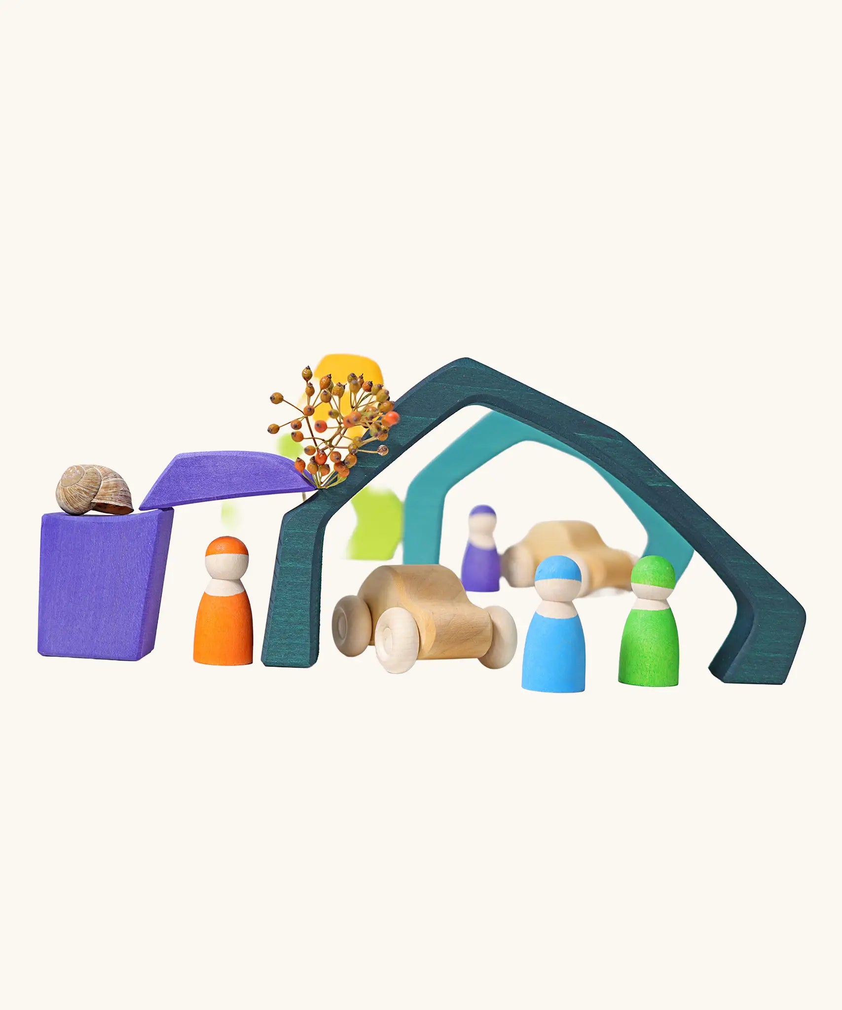 Earth elements from the Grimm's Large 4 Elements wooden Building Set used in a small world play set up with Grimm's friends and cars.