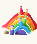 Rainbow elements from the Grimm's Large 4 Elements wooden Building Set used in a small world play set up with Grimm's friends.