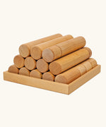Grimm's large wooden building rollers in natural in a tray.