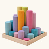 Grimm's large building rollers pastel in a wooden storage tray.