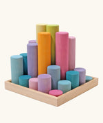 Grimm's large building rollers pastel in a wooden storage tray.