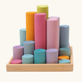 Grimm's large building rollers pastel in a wooden storage tray.