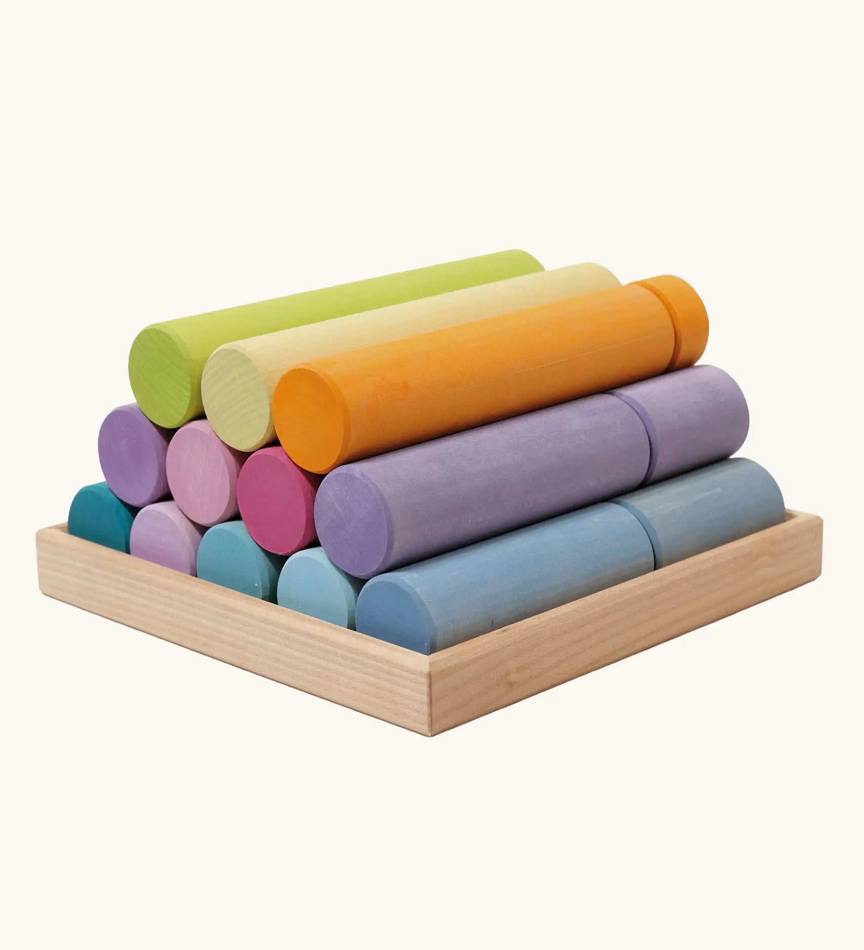 Grimm's large building rollers pastel in a wooden storage tray.