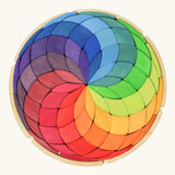 Grimm's Large Colour Spiral in a wooden tray. 