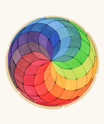 Grimm's Large Colour Spiral in a wooden tray. 