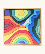 Grimms large elements set showing individual wooden coloured pieces in a frame