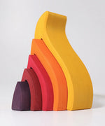 Side of the large Grimms handcrafted wooden fire set showing each flame piece slotting into each other 