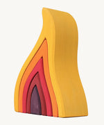 Grimms handcrafted wooden large fire. A set of 5  flame pieces in warm shades perfect for stacking and open ended play