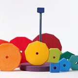Loose Grimms handcrafted wooden geometric blocks in a rainbow palette