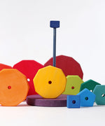 Loose Grimms handcrafted wooden geometric blocks in a rainbow palette
