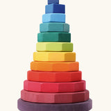 Grimms large geometric tower stacking toy. Includes 12 handcrafted wooden geometric shapes and a base in a rainbow palette