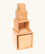 A stack of Grimms large natural wooden building boxes