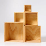 Grimms large natural wooden building boxes stacked on top of eachother