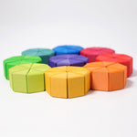 The triangular shaped blocks from the Grimm's Large Octagon Puzzle laid out to form circles. 