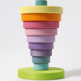 Grimms large conical tower in pastel colours showing a stack inverted on the base