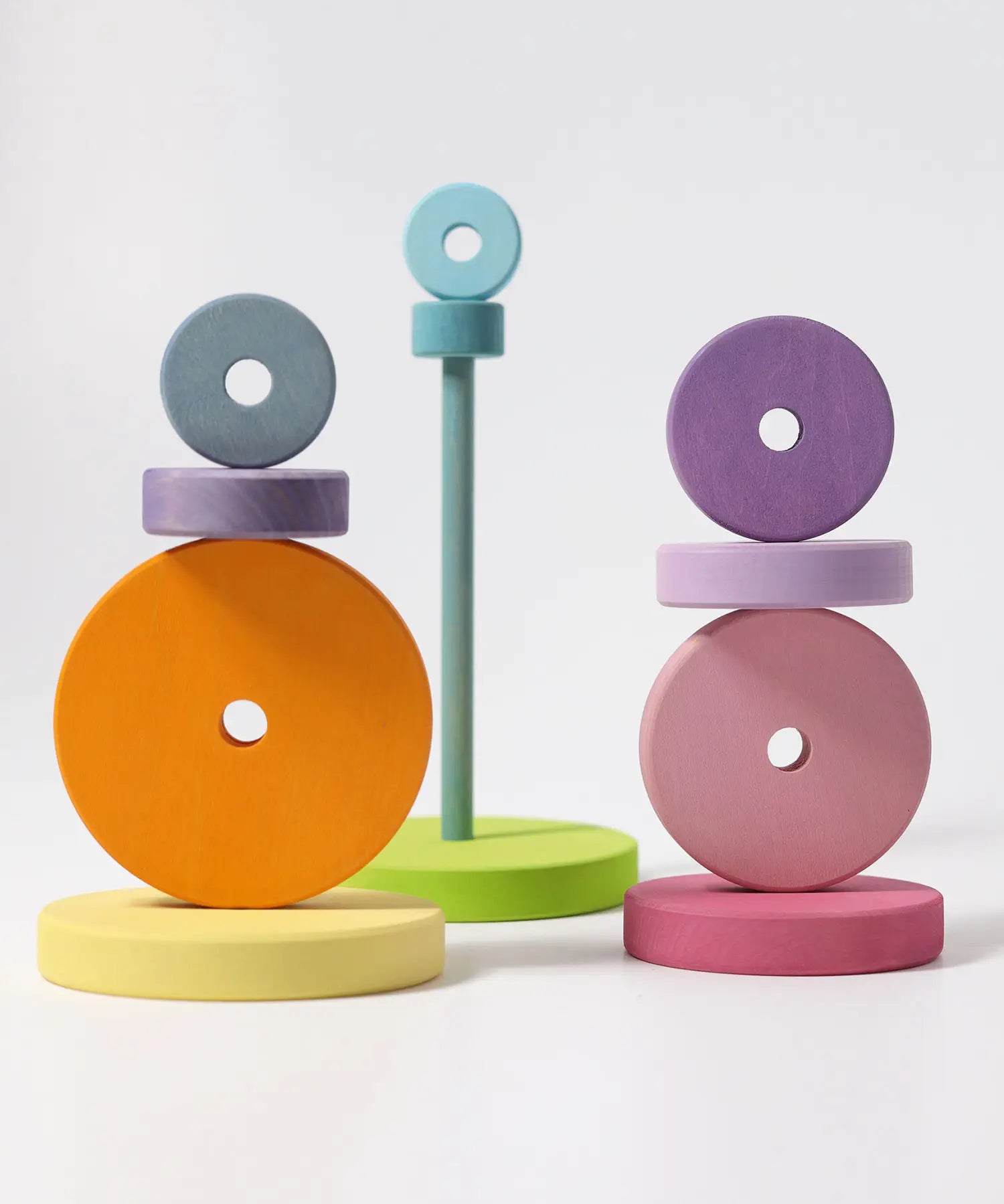A balancing game using the disk pieces from the Grimms large conical tower in pastel colours