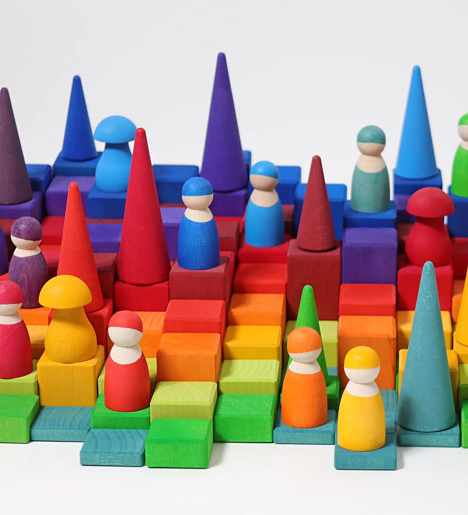 Grimm’s World of Numbers wooden counting toys showing counting blocks, peg dolls, forest and mushroom pieces