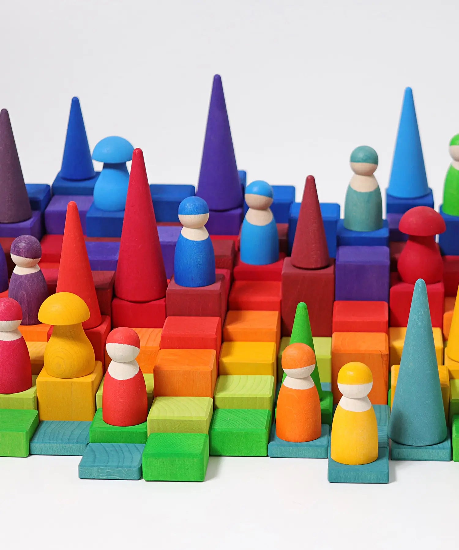 Grimm’s World of Numbers wooden counting toys showing counting blocks, peg dolls, forest and mushroom pieces