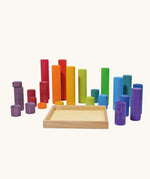 Grimm's large building rollers in bright rainbow colours with a wooden storage tray.