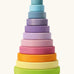 Grimms large wooden conical tower in pastel colours. A 11 piece set with chunky disk pieces, a base with a peg for stacking and counting games